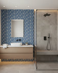 Amber Hour blue botanical leaf wallpaper creating ambiance in a serene bathroom