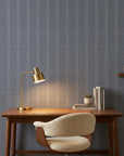 Anchor Chain navy geometric peel and stick wallpaper as a feature wall in a bright home office