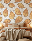 Ancient Ground beige botanical leaf wallpaper adding character to a cozy bedroom