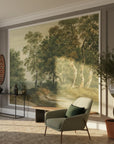 Green and gold Ancient Woodland mural wallpaper showing sunlit forest path in traditional living room