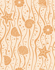 Smooth apricot seashell and starfish peel and stick wallpaper - Apricot Tides