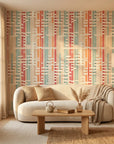 Art Block mid-century geometric wallpaper in a warm and inviting living room