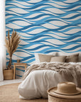 Self-adhesive wall covering featuring a maritime wave design in blue and white