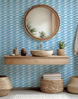 Self-adhesive wall covering featuring a marine wave motif in white and shades of blue