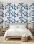 Azure Palms blue tropical jungle toile wallpaper adding character to a cozy bedroom