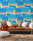 Modern abstract wall covering featuring layered blue and peach paint marks