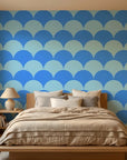 Azure Swell bold blue abstract arc wallpaper adding character to a cozy bedroom