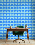 Azure Swell bold blue abstract arc wallpaper as a feature wall in a bright home office