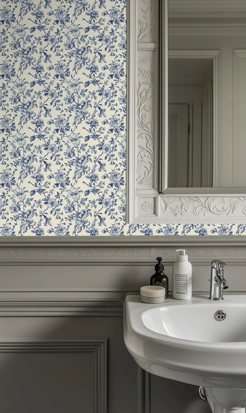 Hand drawn blue floral wallpaper styled in a bathroom, offering a graceful and cohesive backdrop with vintage appeal.