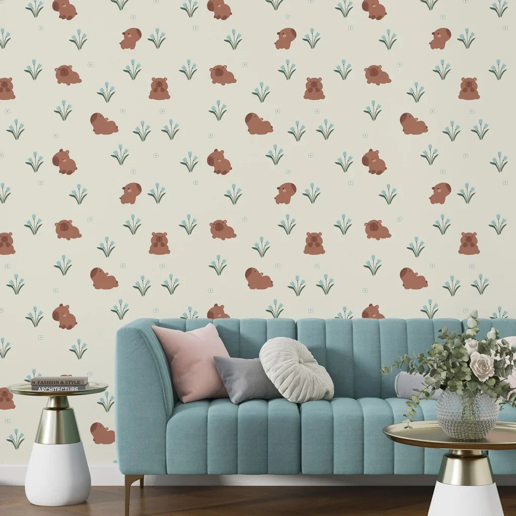 Removable wallpaper design showing a repeating pattern of capybaras and blue flowers - Azure Meadows