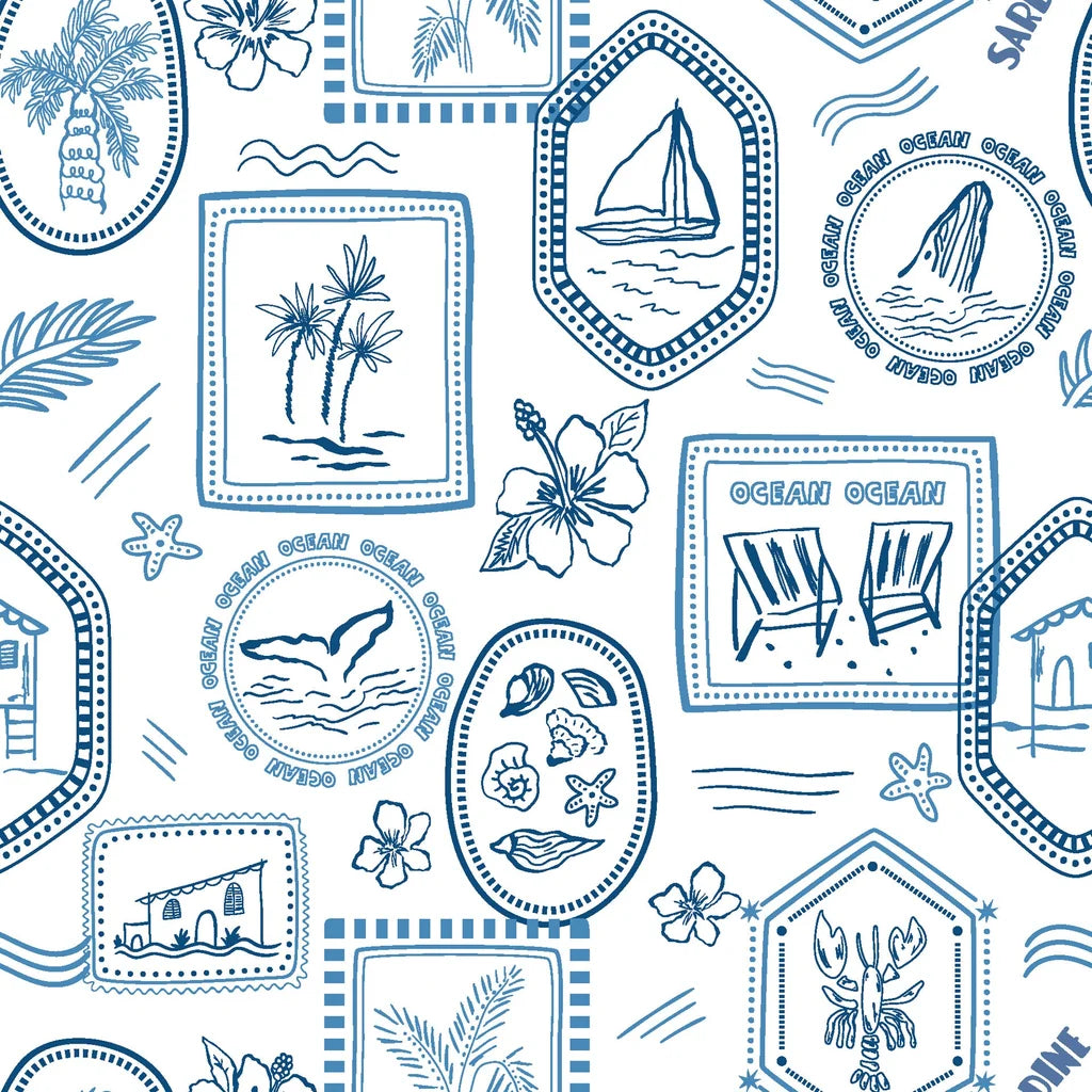 Coastal toile wallpaper pattern with hand drawn ocean scenes including sailboats, palm trees, seashells, whales, and tropical motifs in blue on a white background.