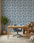 Batik Indigo textured blue floral wallpaper adding character to a cozy bedroom