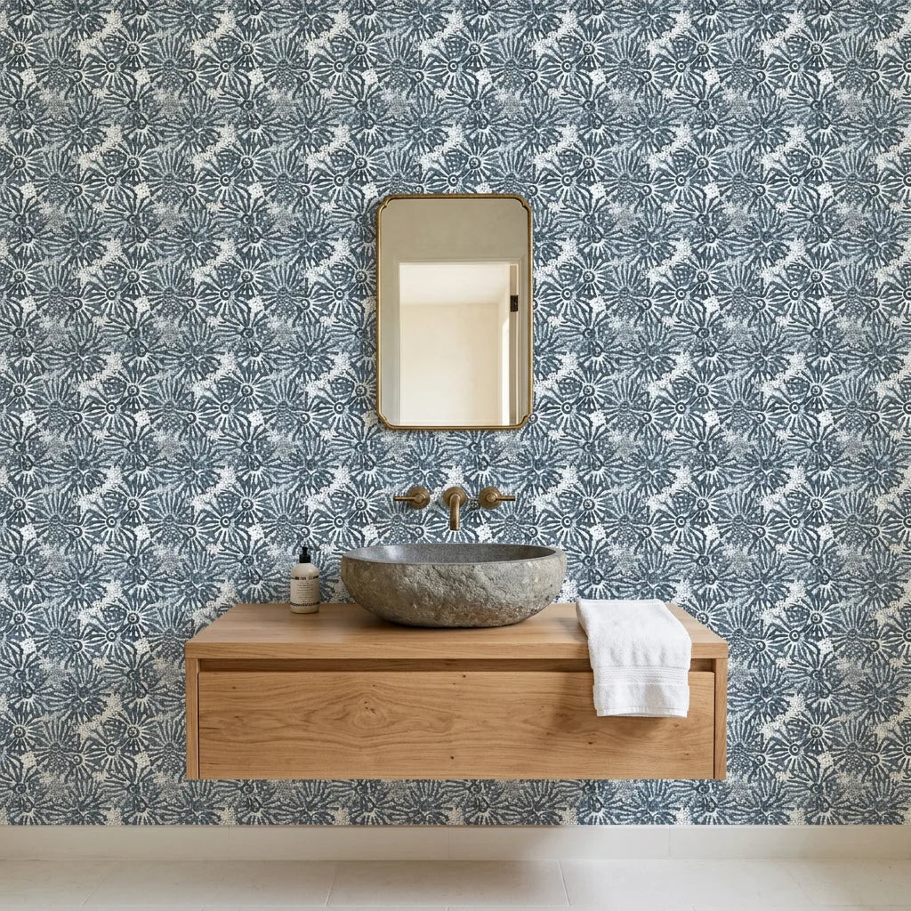 Batik Indigo textured blue floral wallpaper as a feature wall in a bright home office