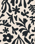 Starkly defined black floral outlines, providing a dramatic and contemporary design element.