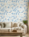 Bloom Archive soft blue floral blossom wallpaper in a warm and inviting living room