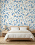 Bloom Archive soft blue floral blossom wallpaper adding character to a cozy bedroom