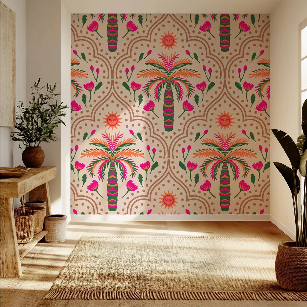 Pink and green palm arch peel and stick wallpaper in a bohemian style featuring tropical leaves