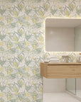 Blue Fossil distressed botanical peel and stick wallpaper as a feature wall in a bright home office