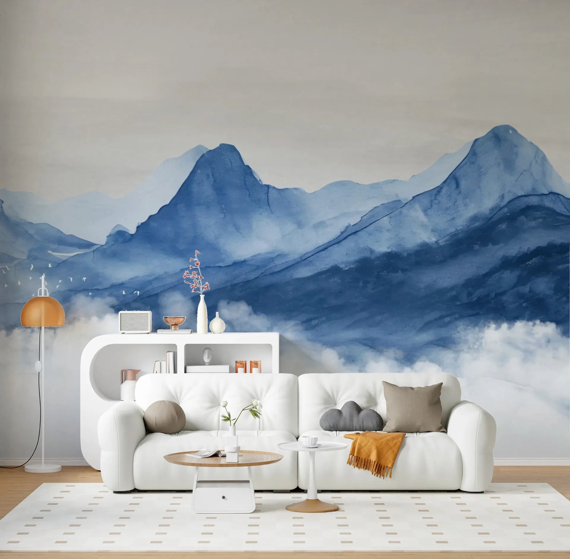 Blue Mountains watercolor wallpaper with gradient peaks and clouds on modern living room accent wall