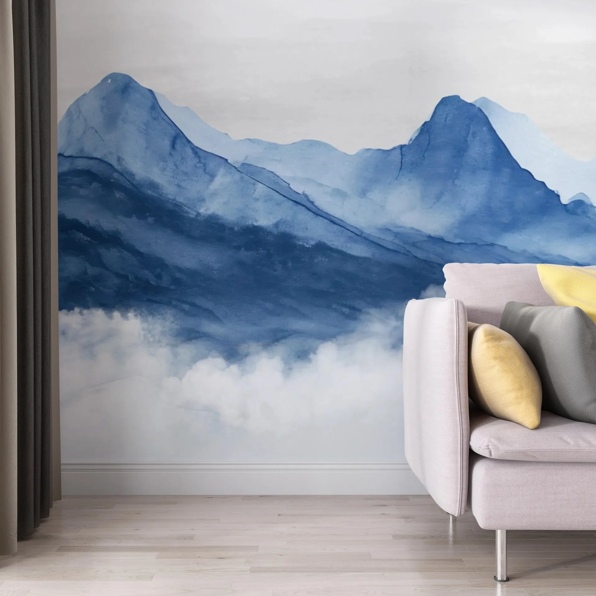 Navy and light blue watercolor mountain mural wallpaper in modern living room with clouds