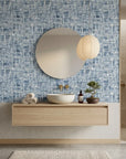 Blue Noise abstract textured peel and stick wallpaper creating ambiance in a serene bathroom