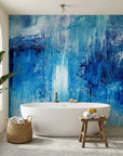 Blue Torrent dramatic deep blue abstract wallpaper as a feature wall in a bright home office
