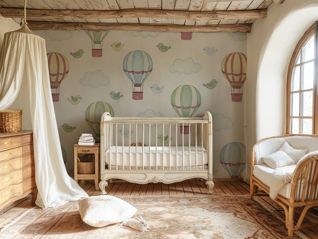 Fanciful hot air balloons and bluebirds soar through the air as the central theme of this vintage baby room design