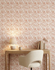 Blush Frond peach botanical peel and stick wallpaper enhancing the charm of a stylish dining room