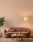 Blush Meander pink and cream retro stripe wallpaper in a warm and inviting living room