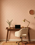 Blush Meander pink and cream retro stripe wallpaper as a feature wall in a bright home office