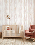 Blush Rainfall pale pink woodgrain wallpaper as a feature wall in a bright home office