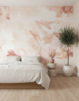 Soft pink watercolor peel and stick wallpaper with flowing design
