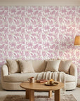 Blush Tropics pink botanical peel and stick wallpaper adding character to a cozy bedroom