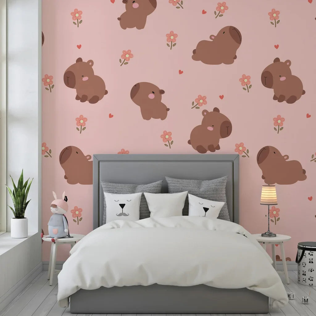 Adorable brown capybaras nestled among soft pink blossoms on a self-adhesive wall mural - Blush Blooms