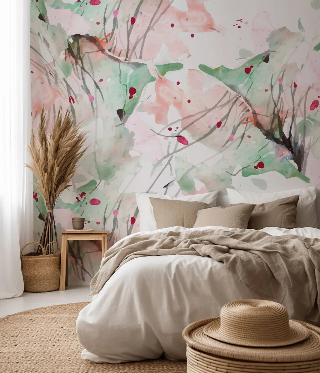 A watercolor wall covering featuring abstract splotches of pink and green hues, titled Blush Thicket