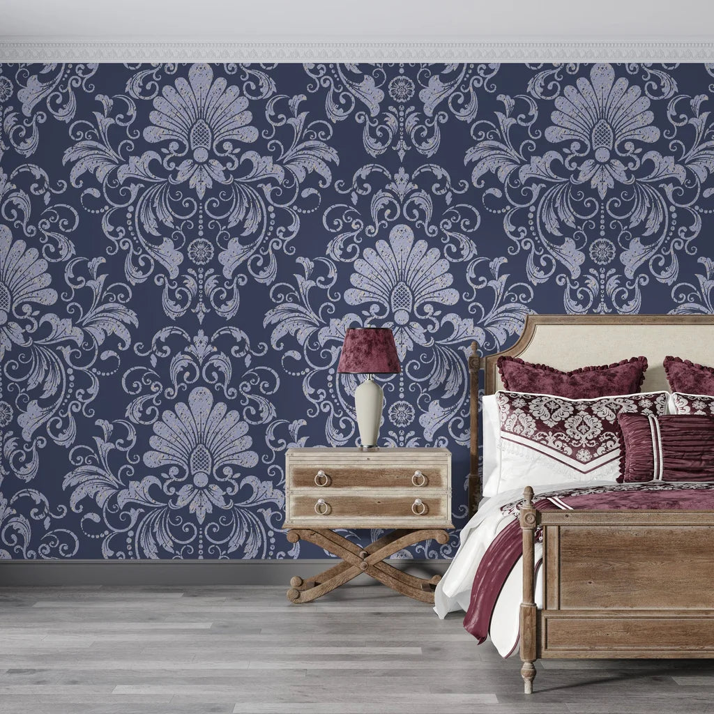 Navy and silver Blushed Whisper damask wallpaper on bedroom accent wall with ornate scrollwork pattern