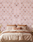 Blushing Arches elegant rose gold art deco wallpaper in a warm and inviting living room