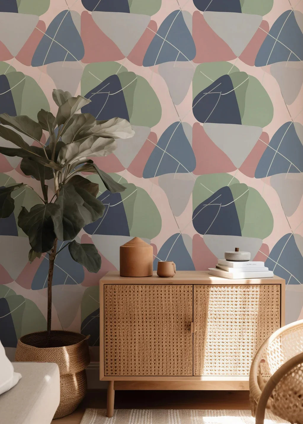 Non-representational wallpaper featuring overlapping, organic forms; the color scheme includes soft gray, dusty pink, deep navy, and sage, accented by thin crisscrossing lines