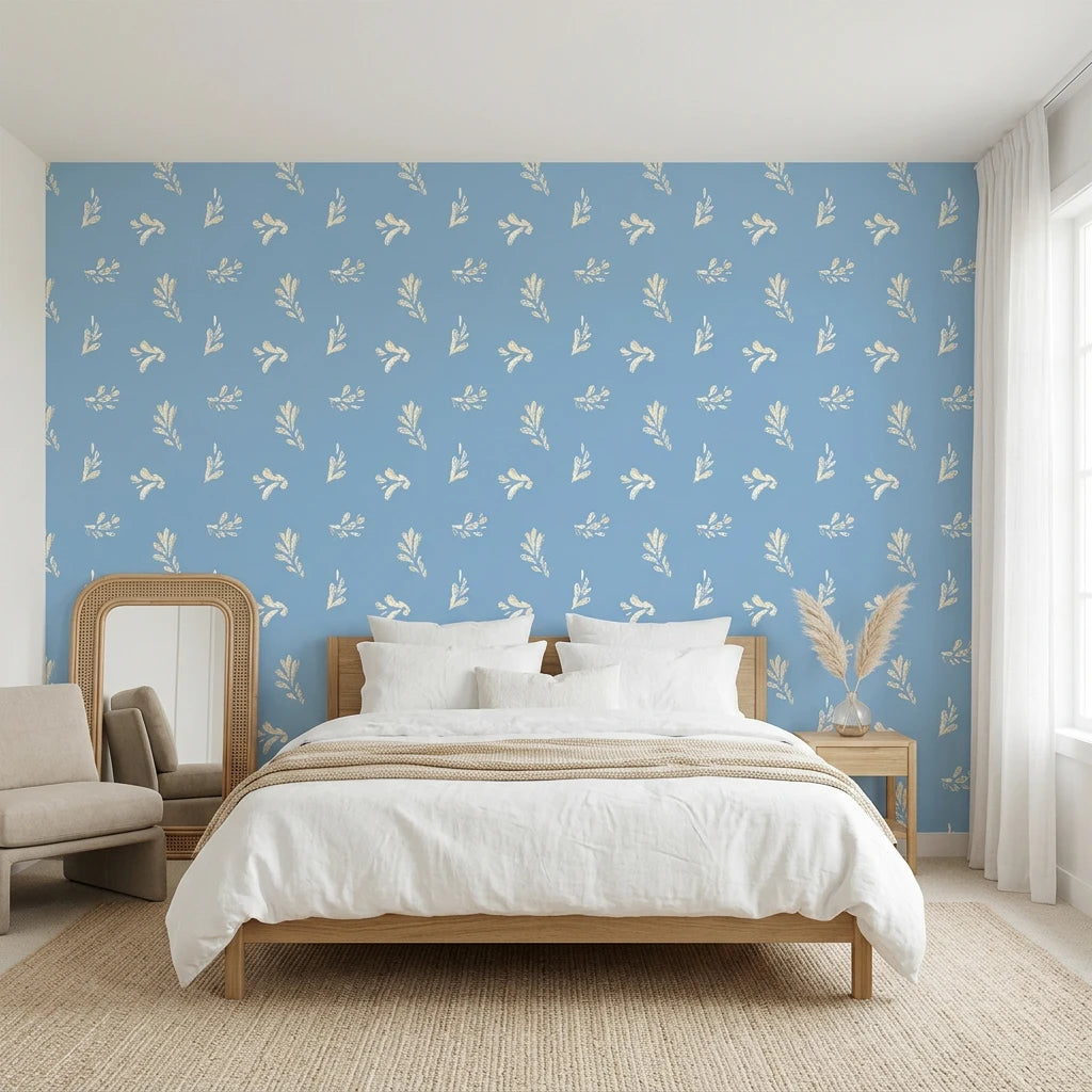 Borrowed Blue serene blue botanical sprig wallpaper adding character to a cozy bedroom