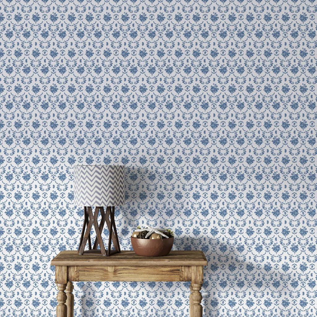 Blue and white Botanica Grace floral damask wallpaper in Mediterranean-style room setting