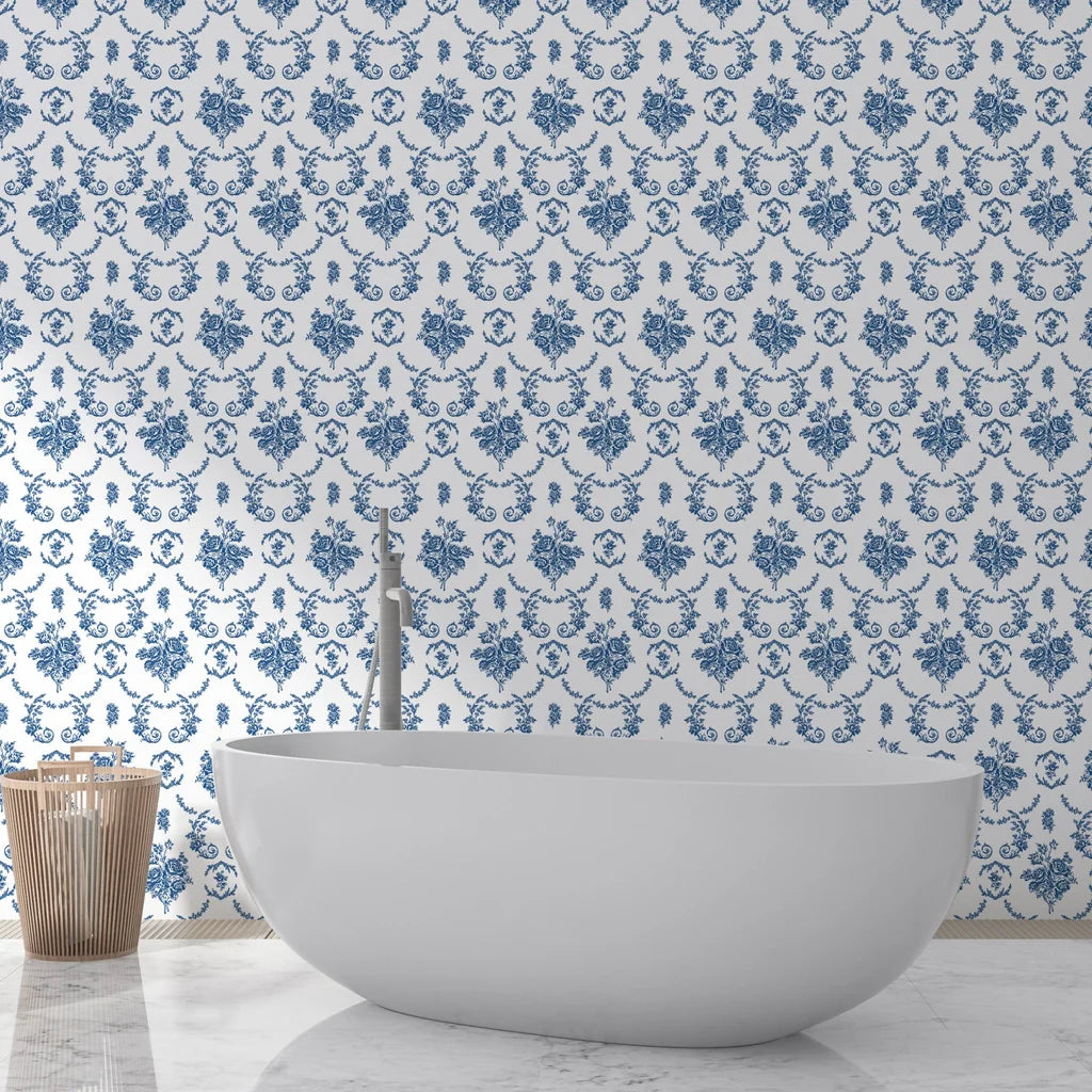 Blue and white Botanica Grace damask wallpaper in traditional bathroom with freestanding tub