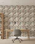 Botanist's Study sage botanical branch wallpaper as a feature wall in a bright home office