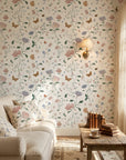 Bow & Bloom delicate wildflower floral wallpaper in a warm and inviting living room