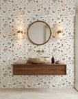 Bow & Bloom delicate wildflower floral wallpaper creating ambiance in a serene bathroom