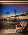Bridges To Forever wallpaper mural featuring illuminated San Francisco Bay Bridge at twilight in home office setting