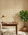 Brushed Gold neutral abstract peel and stick wallpaper as a feature wall in a bright home office