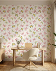 Bubblegum Flutter pink and yellow butterfly wallpaper as a feature wall in a bright home office