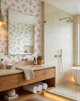 Bubblegum Flutter pink and yellow butterfly wallpaper creating ambiance in a serene bathroom