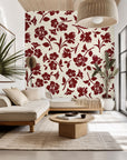 Self-adhesive wallpaper featuring a deep red floral silhouette pattern against an ivory-colored background
