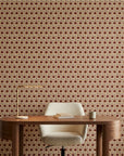 Burgundy Stack retro geometric wallpaper adding character to a cozy bedroom